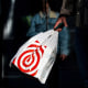 Person holds Target and Old Navy bags. 