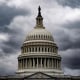 Storm clouds pass over the Capitol in January.