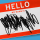 Photo illustration of a "Hello, my name is" tag with scribbles.