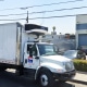 Exclusive Poultry truck outside the building.