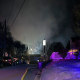 Image: Smoke rises over a neighborhood where Virginia police say a house exploded 