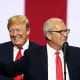 Donald Trump smiles as Kevin Cramer speaks to supporters during a campaign rally in Fargo in 2018.