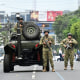 Soldiers block the street in San Salvador in El Salvador