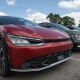 Kia electric vehicles on car dealership lot for sale in Detroit on Thursday, July 13, 2023.  
