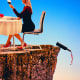 Photo Illustration: A couple has dinner near the edge of a cliff, as a wine bottle topples over the edge