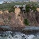 Aerial view of homes along Scenic Drive standing on the edge of a cliff