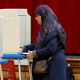 Voters cast their ballots at a polling location in Dearborn, Mich.