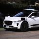 Self-driving Waymo cars on the road in Santa Monica