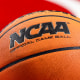 A detail view of the NCAA logo on a basketball