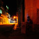 A woman uses her mobile phone in downtown Havana, Cuba, March 17, 2024. 