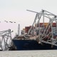 Cargo ship Dali is seen after running into and collapsing the Francis Scott Key Bridge