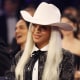 Beyoncé wearing a cowboy hat at the Grammy Awards.