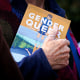 A person holds the Gender Queer memoir.