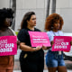 Members of Florida Planned Parenthood PAC Abortion rights activists hold signs that read "Bans   off our Bodies, " and "Abortion is Health Care"