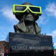 Eclipse glasses are worn by a statue of George Washington on April 7, 2024, in Houlton, Maine. 