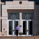 A man enters the Arizona Supreme Court building, Wednesday, April 10, 2024, in Phoenix. 