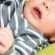 Coughing newborn week-old baby