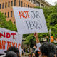 Students protest layoff at the University of Texas at Austin on Monday, April 15, 2024.