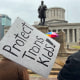 Demonstrators advocate for transgender rights outside the Ohio Statehouse on Jan. 24, 2024, in Columbus.
