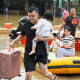Floods swamped a handful of cities in southern China’s densely populated Pearl River Delta following record-breaking rains, sparking worries about the region’s defenses against bigger deluges induced by extreme weather events.