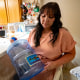 The Dietz family relies on bi-weekly water deliveries for basic needs since their water was tainted in 2021.