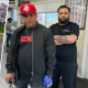 El dueño de la barbería Osvaldo Lugo, (izquierda), y el barbero Rafael Santana salieron corriendo de su negocio para salvar a una niña.