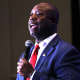 Tim Scott speaks on stage during the First in the Nation Leadership Summit in Nashua, New Hampshire.