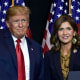 Donald Trump and Kristi Noem on stage in Sioux Falls, S.D.