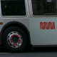 A Muni bus pulls into a stop