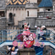 Actors dressed as Walt Disney characters Minnie Mouse and Mickey Mouse perform during a press preview for the "Minnie Besties Bash!" parade at Tokyo DisneySea