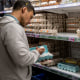 A customer shops for eggs at a H-E-B grocery store on Feb. 8, 2023 in Austin, Texas. 