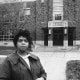 Linda Brown Smith in front of the Sumner School in Topeka, Kan., on May 8, 1964. 