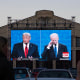 People watch the debate on a large outdoor screen