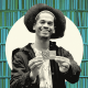 Photo illustration of librarian Mychal Threets holding up a NYPL card 