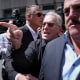 Robert De Niro, center, points his finger while arguing with a Donald Trump supporter near Manhattan Criminal Court.