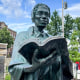 A statue of Sojourner Truth holding an opened book