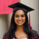 Shruthi Kumar smiles in her cap and gown