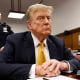 Former President Donald Trump sits in the courtroom for his trial at the Manhattan criminal court, on May 21, 2024, in New York.