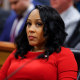 Fani Willis seated during a hearing in Atlanta