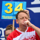 Defending champion Joey Chestnut competes in the Nathan's Famous hot dog eating contest on July 4, 2023, at Coney Island in Brooklyn.