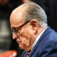 Rudy Giuliani side profile as he looks down