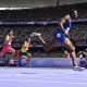 Grant Holloway crosses the finish line in the men's 110m hurdles at the Paris 2024 Olympic Games at Stade de France in Saint-Denis, north of Paris, on August 4, 2024. 