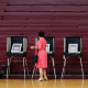 A voter uses an electronic voting machine to cast a ballot