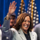 Kamala Harris walks and waves