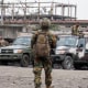 Security forces outside Makala prison.