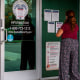 A woman outside a Social Security Office