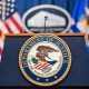 Seal of the Department of Justice.