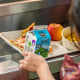 A child with their school lunch.