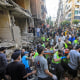 An injured man is evacuated from the scene of an Israeli strike in Beirut's southern suburbs on Sept. 20, 2024. 