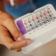 Teenage Girl Holding Birth Control Pills